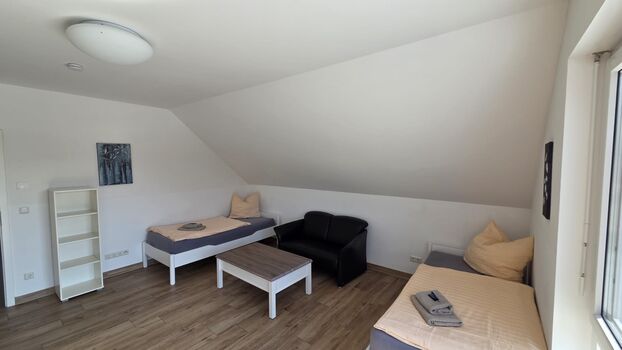 Einfamilienhaus bis 10 Personen - Schlafzimmer 1 mit zwei Einzelbetten Einfamilienhaus bis 10 Personen - Schlafzimmer 1 mit zwei Einzelbetten