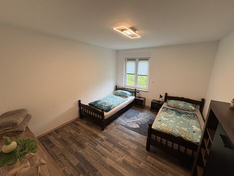 Wohnung 1: Schlafzimmer mit 2 Einzelbetten Wohnung 1: Schlafzimmer mit 2 Einzelbetten