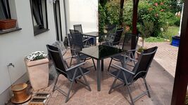 Im Eingangsbereich unter der Pergola Im Eingangsbereich unter der Pergola