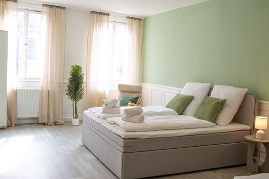 Schlafzimmer für 4 Personen mit zwei Doppelbetten Schlafzimmer für 4 Personen mit zwei Doppelbetten