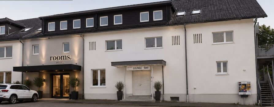 Hotel .rooms: Top-Lage D/CH-Grenze: Modernes Boarding House am Bahnhof Bild 1 Hotel .rooms: Top-Lage D/CH-Grenze: Modernes Boarding House am Bahnhof Bild 1