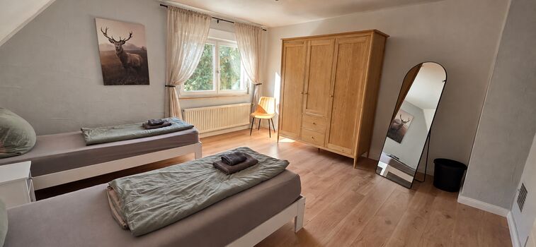 Schlafzimmer 2 im Haus Schlafzimmer 2 im Haus
