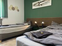 Komfortable 2-Zimmer-Wohnung mit Terrasse und Parkplatz Foto 1 Komfortable 2-Zimmer-Wohnung mit Terrasse und Parkplatz Foto 1