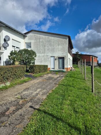 Wohnung 1: eigener Eingang unten am Hang