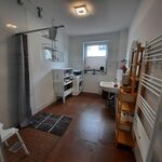 Duschbad mit Waschmaschine