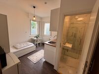 Zentrum gelegene Apartments mit 1, 2 oder mehrbettzimmern Bild 2