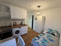 Zentrum gelegene Apartments mit 1, 2 oder mehrbettzimmern Bild 1