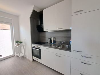 Neubau-Wohnung Nähe VW, Hochschule, Hafen u. Einkaufszentrum Bild 1