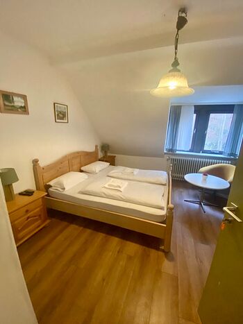 Einzelzimmer mit Doppelbett