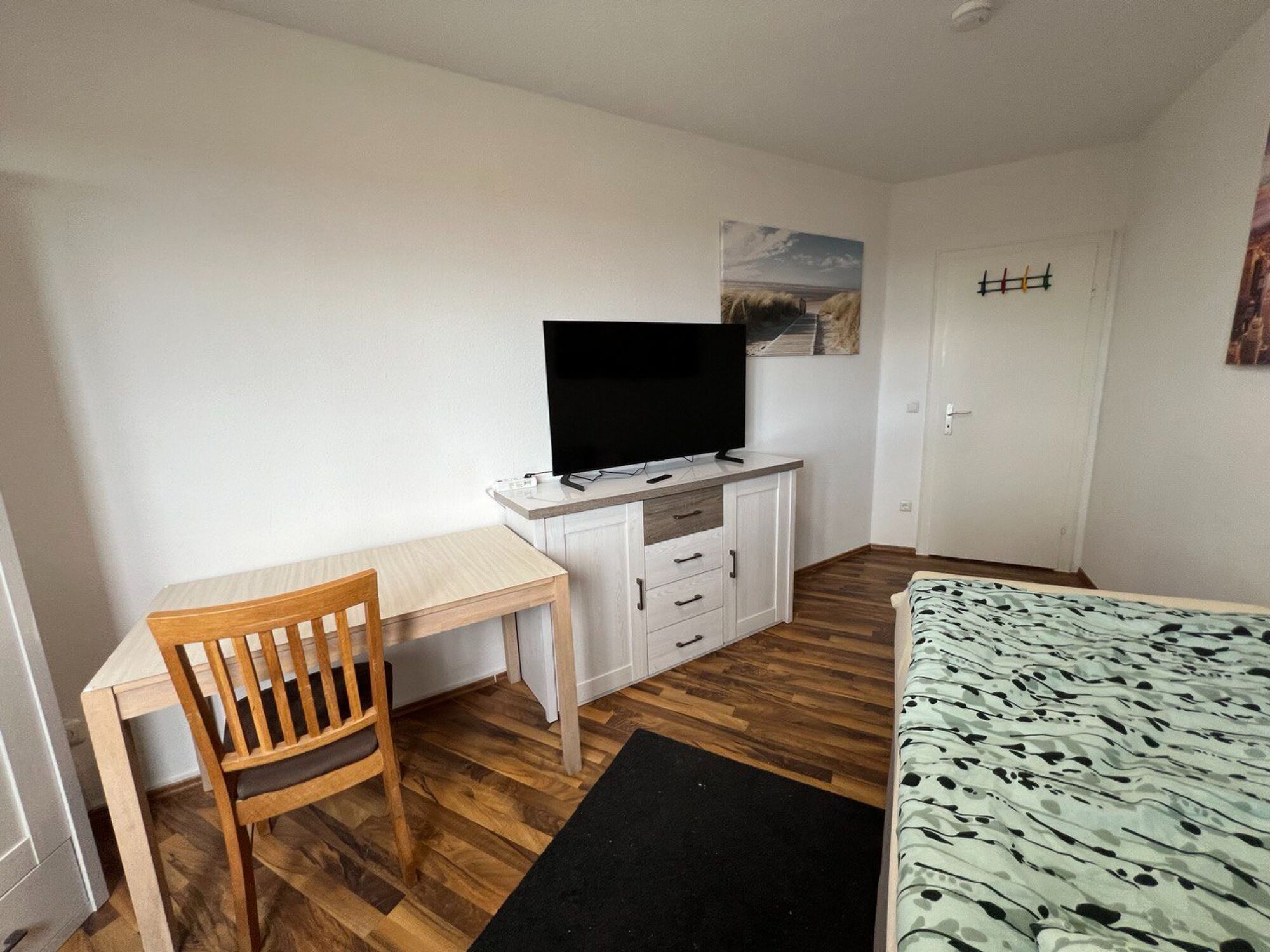 1‑Bett-Zimmer