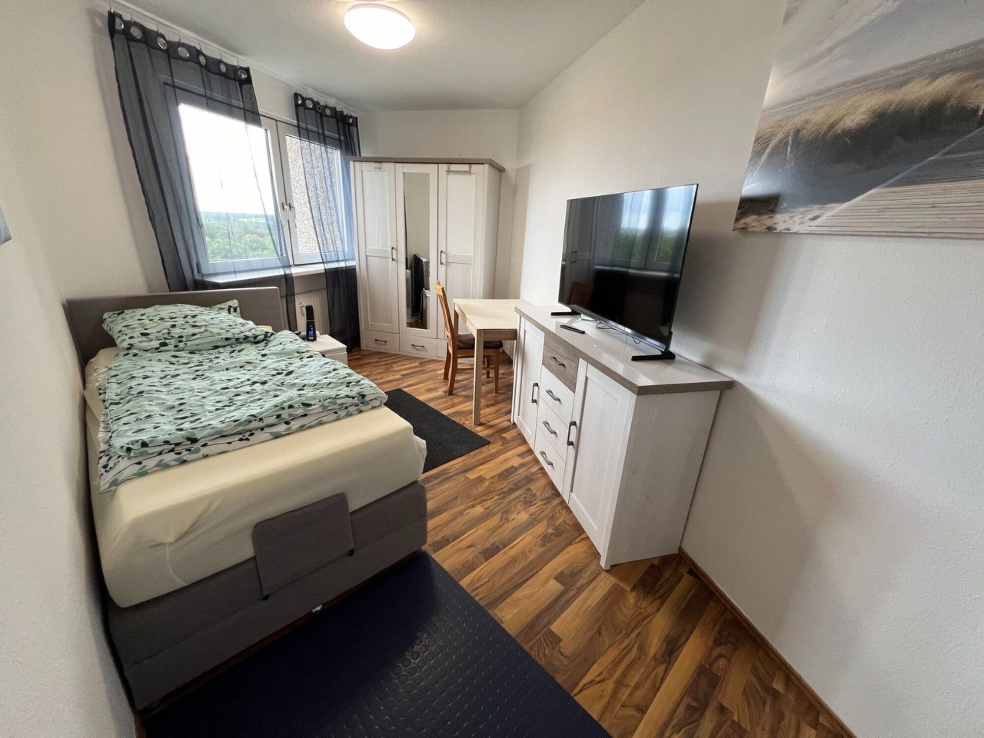 1‑Bett-Zimmer