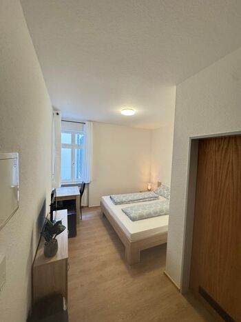Kompakte Wohnung ohne Küche am Marktplatz Foto 3