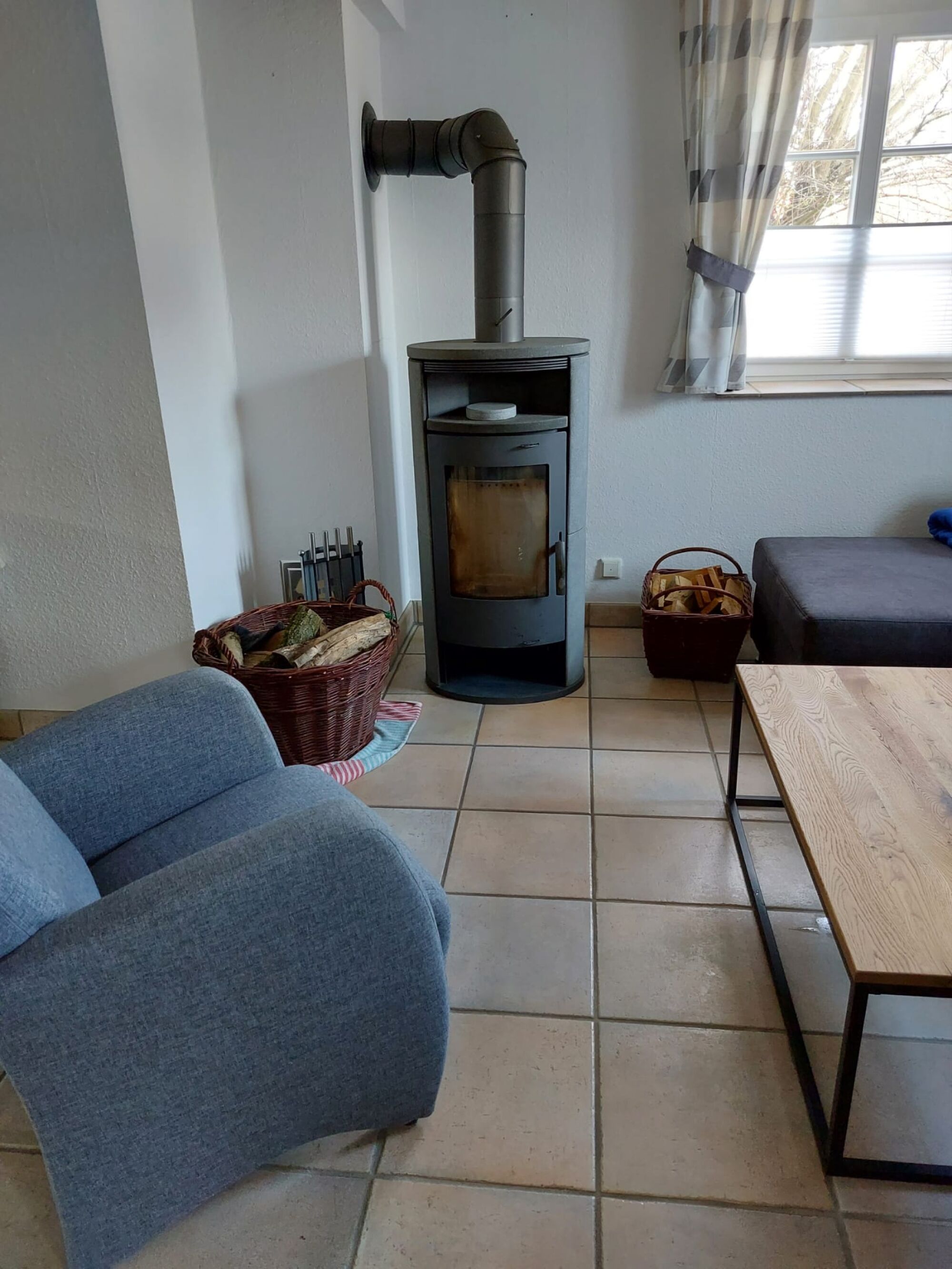 Wohnzimmer Kaminofen Apartment 1