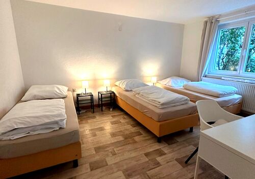 3 Bett Zimmer