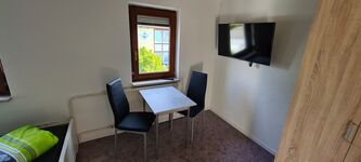 Moderne 1 Zi. Appartments für 2-3 Pers. | Busch Immobilien Bild 2