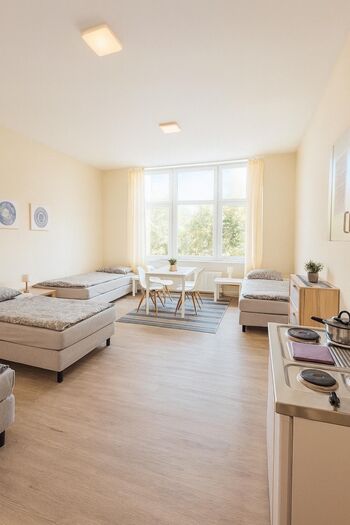 35 Zimmer (EZ/DZ) & 15 Apartments | WLAN | Küche | Zentrale Lage | Ruhig Bild 2