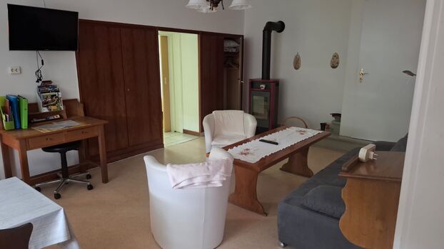 Wohnzimmer mit Kamin 
