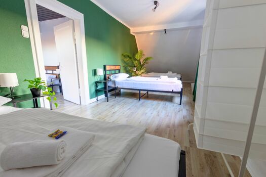 Schlafzimmer 3 mit drei Betten.