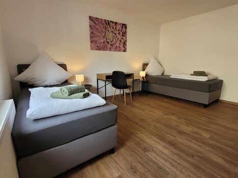 Schlafzimmer 1