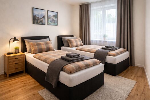 Schlafzimmer 2 mit zwei Einzelbetten