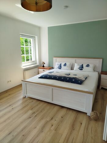 Schlafzimmer mit einem 1,80m Doppelbett