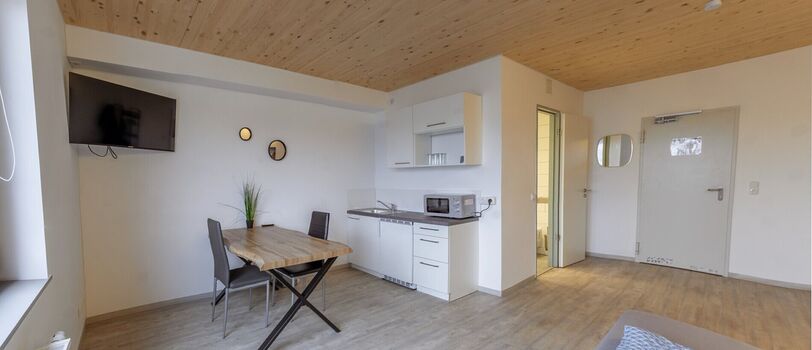 Apartment mit Essplatz und TV