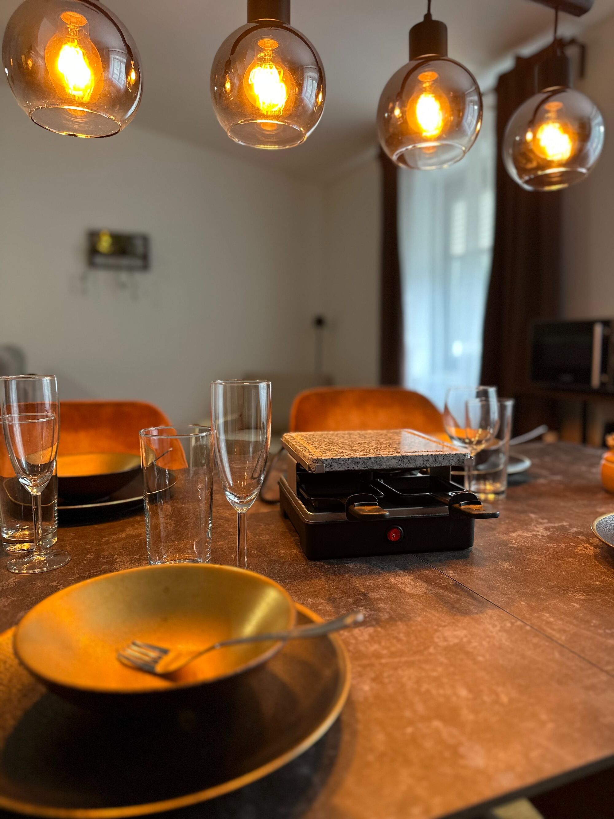 Esstisch mit Raclette