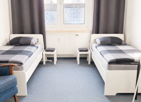 Schlafzimmer 1 (2 Einzelbetten)