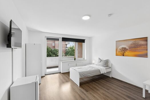 Balkon und Parkplatz | Komfortable Unterkünfte in Bergkamen Bild 2