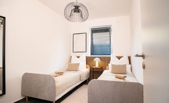 Gästezimmer mit zwei Einzelbetten