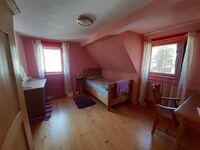 Charmante farbenfrohe Unterkunft Bild 1