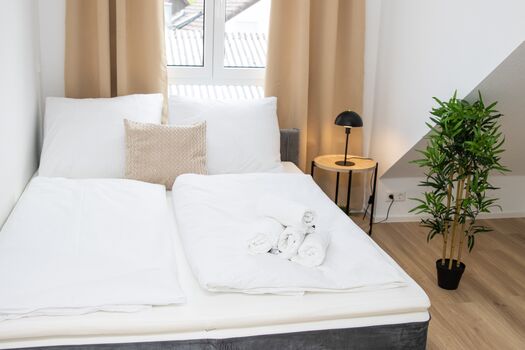Schlafzimmer 2 mit einem Doppelbett