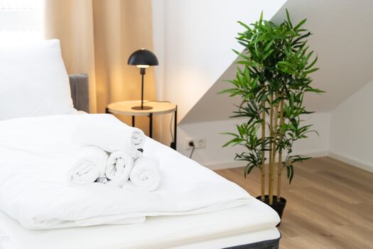 Schlafzimmer 2 mit einem Doppelbett