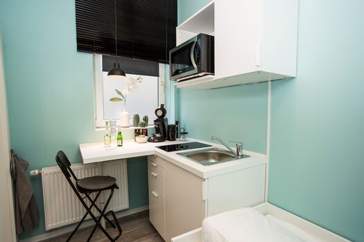 8 Studios mit eigenem Bad, Kitchenette, Waschmaschine, WLan und TV Bild 3