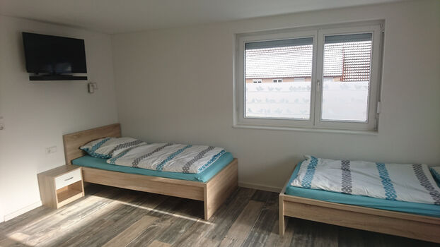 Dreibettzimmer im Obergeschoß