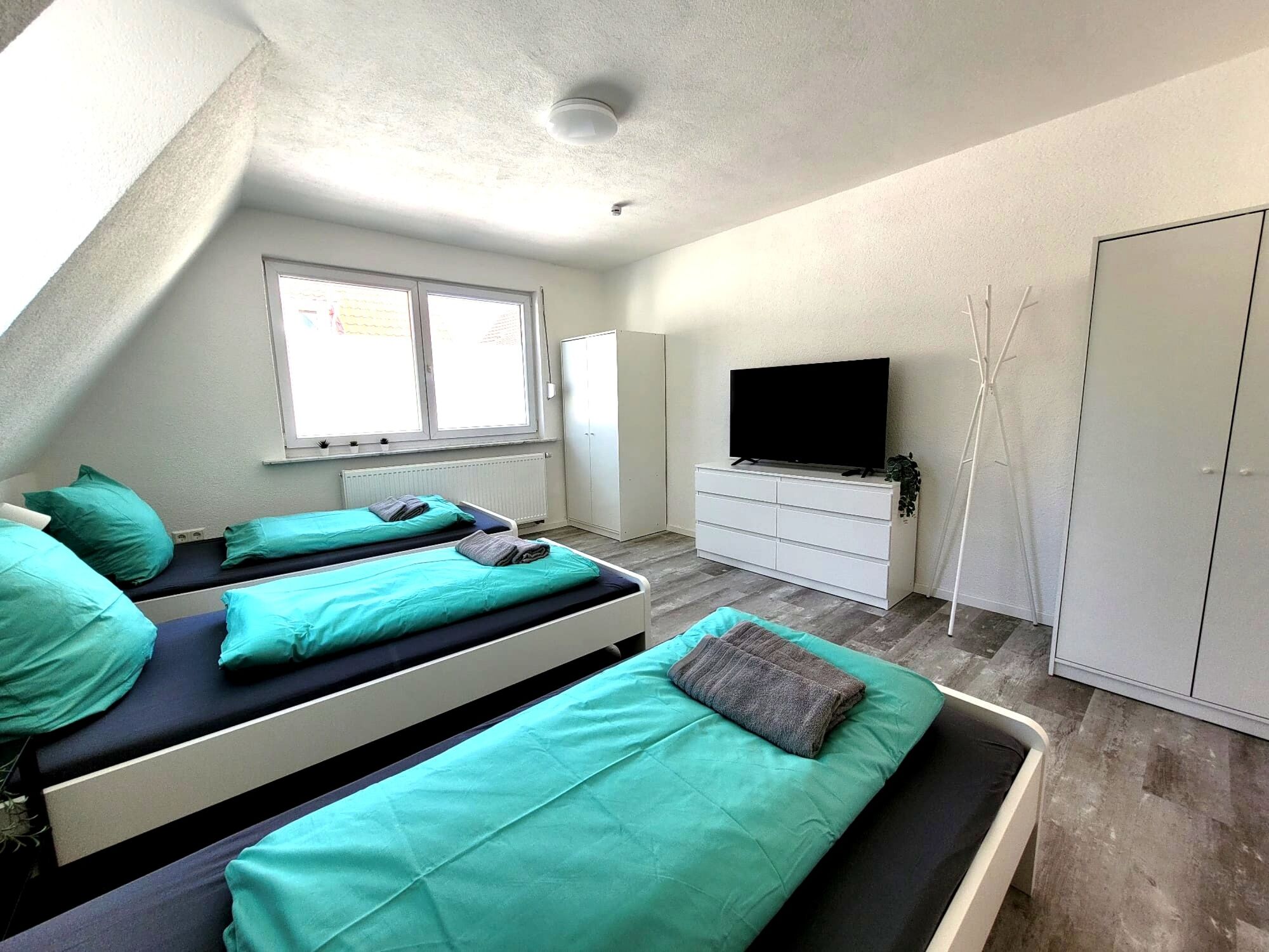 Schlafzimmer (2 oder 3 Einzelbetten)