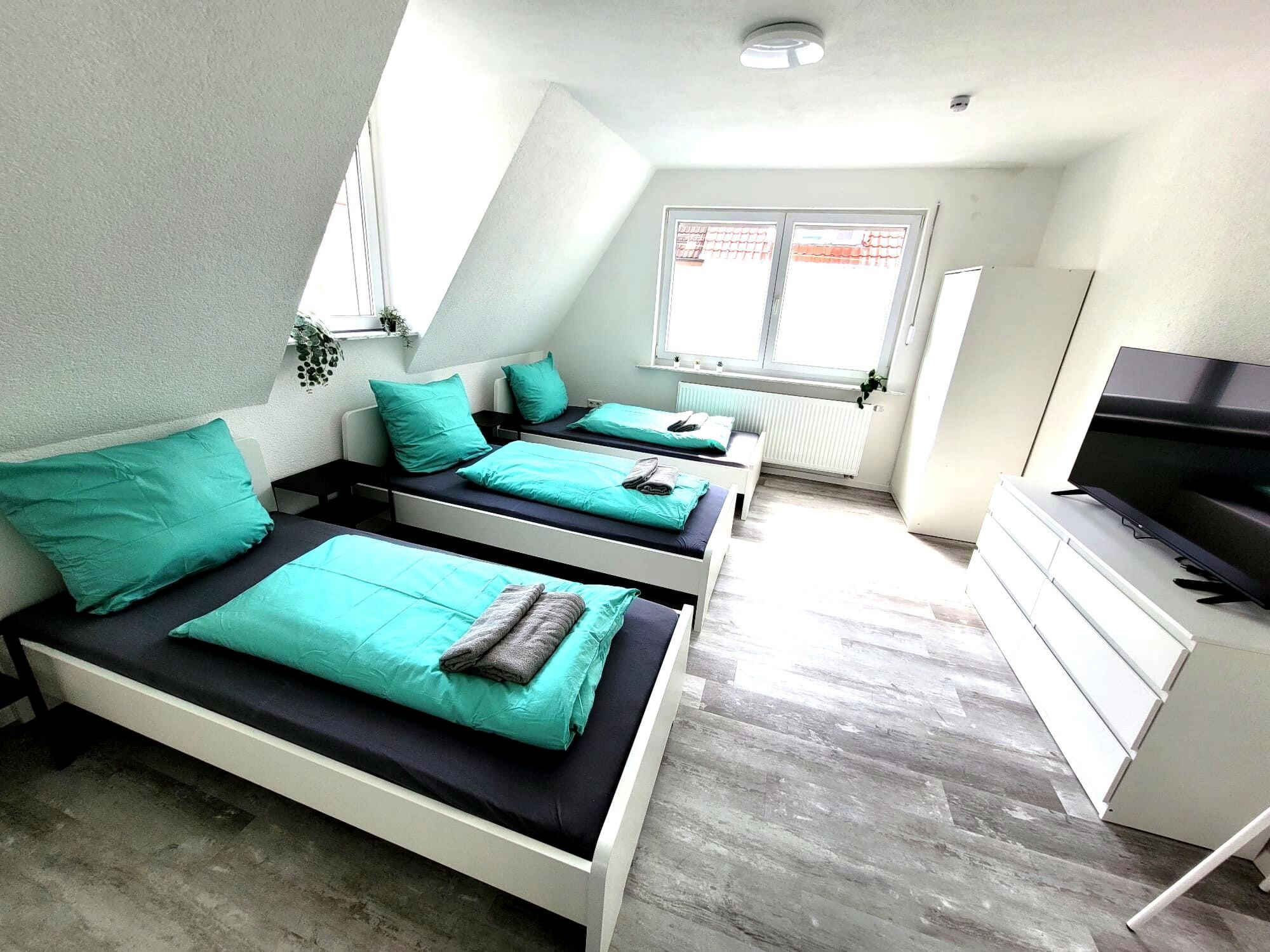 Schlafzimmer (2 oder 3 Einzelbetten)