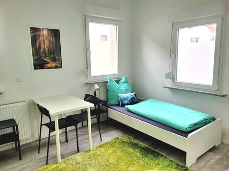 Schlafzimmer (2 oder 3 Einzelbetten)