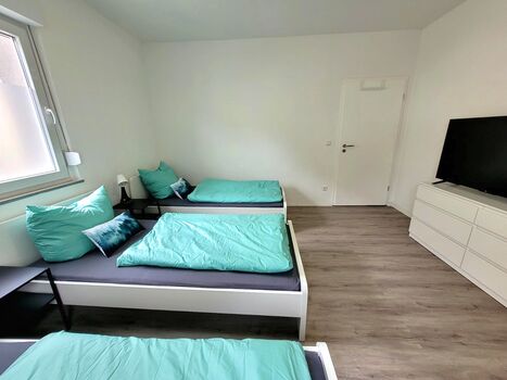 Schlafzimmer (2 oder 3 Einzelbetten)