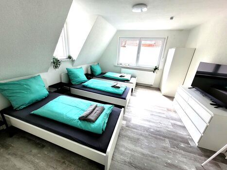 Schlafzimmer (2 oder 3 Einzelbetten)