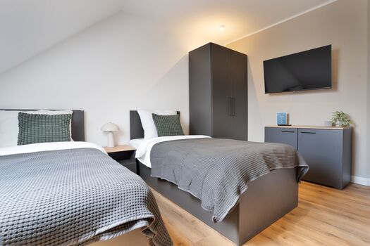 Modern eingerichtete Studios mit voll ausgestatteter Küche Foto 2