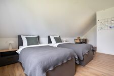 Modern eingerichtete Studios mit voll ausgestatteter Küche Bild 2
