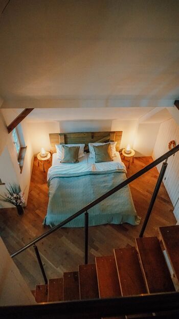 Doppelbett im EG des Maisonette Appartements