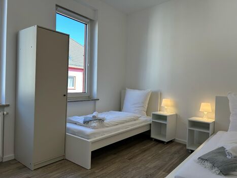Modernes Apartment mit 3 Einzelbetten & Waschmaschine Bild 1
