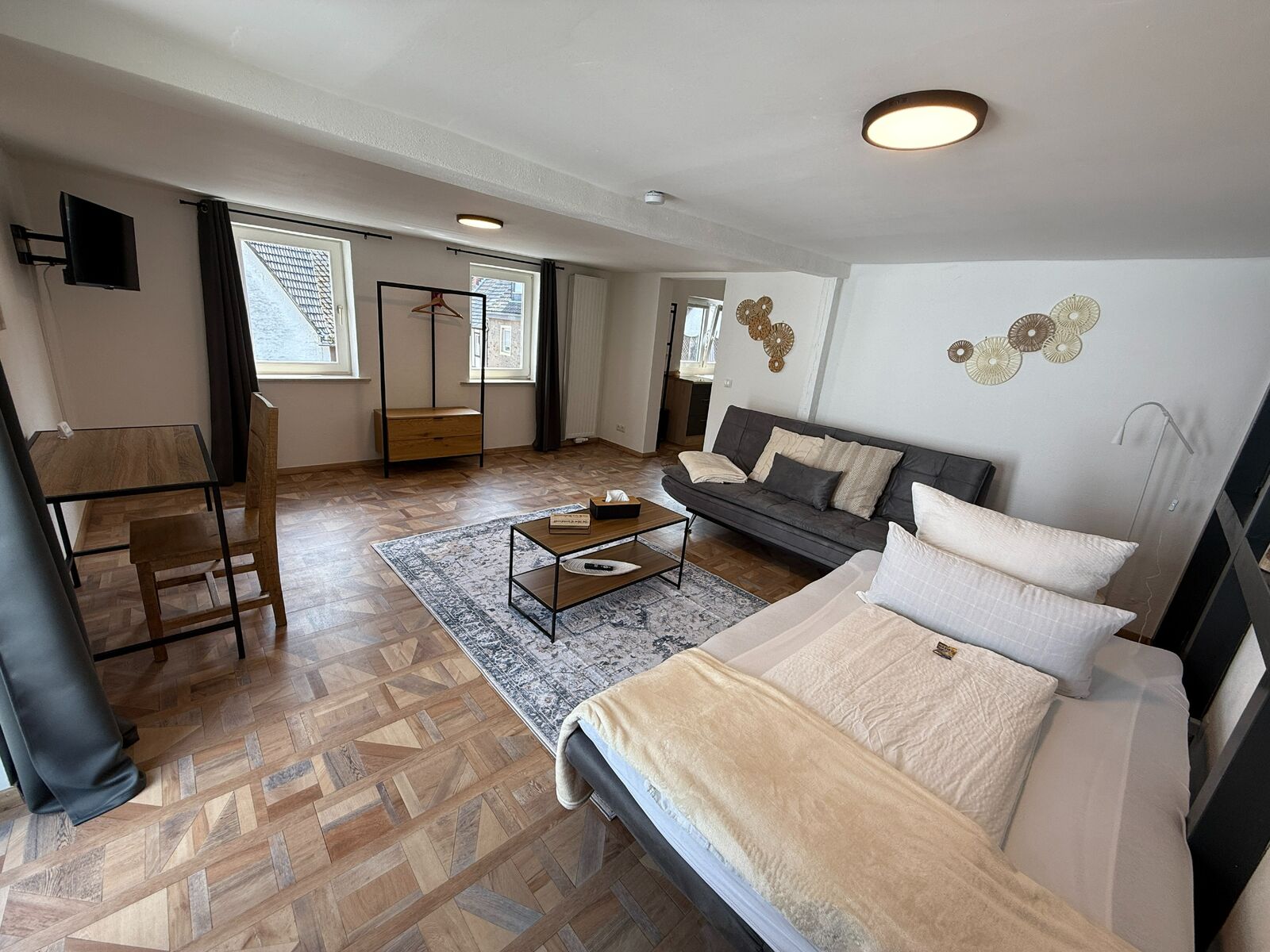 Wohnzimmer mit 2 Schlafsofas