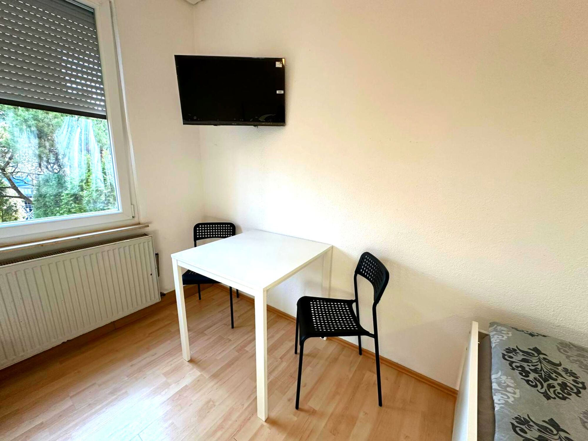 Fernseher und Sitzecke Schlafzimmer