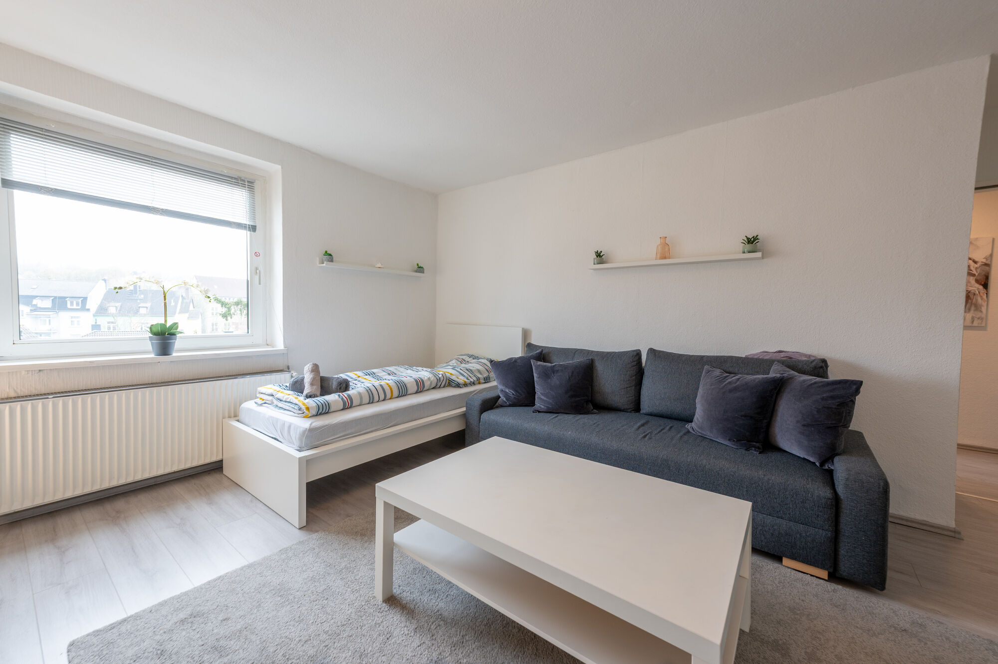 Wohnung 2: 2 Einzelbetten (Wohnzimmer)