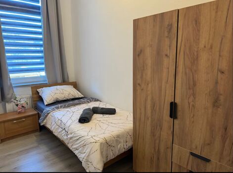 Schlafzimmer mit 1 Einzelbett - Apartment 1
