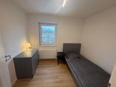 1 Bettzimmer Apartment 1