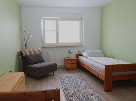 Schlafzimmer mit zwei Betten